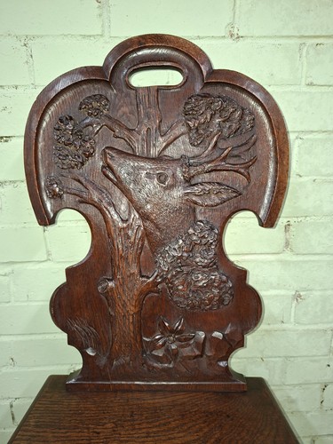 Carved oak chair the - oak,