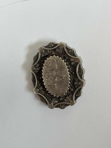 Vintage ornate tin brooch - ornate,