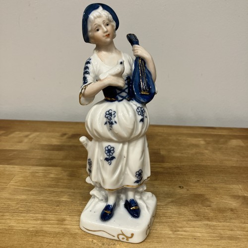 Porcelain figurine woman - figurine, of