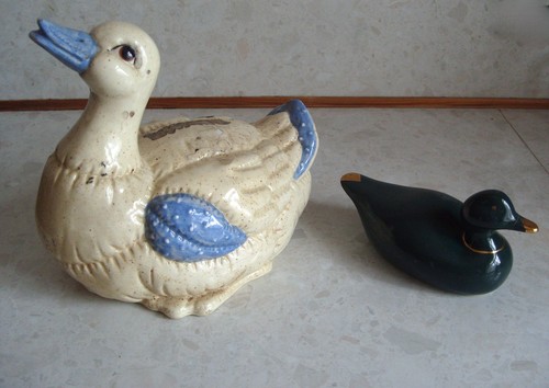 Two outdoor pottery duck - duck, goose