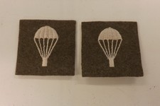 TWO MILITARY CLOTH BADGES