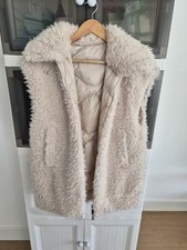 BN authentic Moncler faux fur vest size 0. Both side