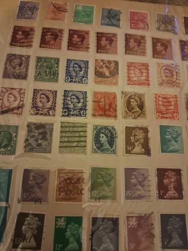 Stamp album containing - stamp,