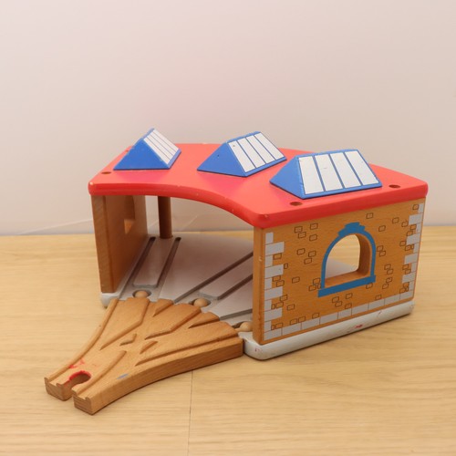 Wooden train shed with three - train,