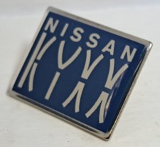NISSAN KYXX LOGO PIN BADGE LAPEL BROOCH ADVERTISING TRANSPORT COLLECTABLE