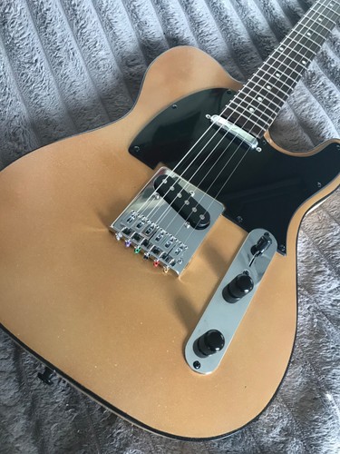 Gold telecaster with - with, dusting