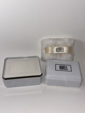 Norell Vintage Perfume Dusting