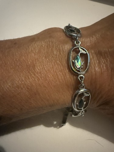 Silver tone bracelet - tone, with