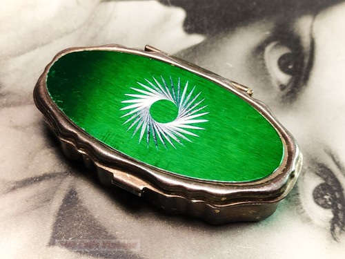 Metallic green and silver