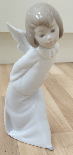 Lladro curious angel figurine - lladro,