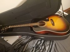 Acoustic Guitar With Case And