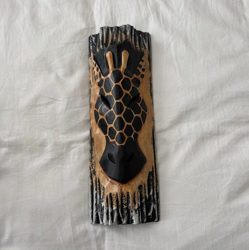 Hand carved wooden giraffe - hand,