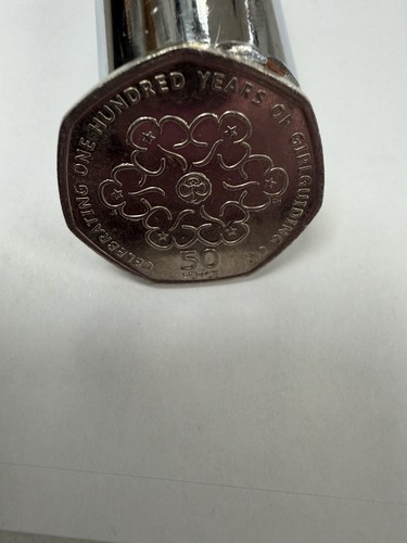 Coin celebrating one - of,