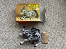 Tin Jumping Zebra
