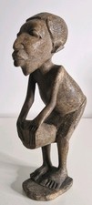 African Hand-Carved Wooden Figure African Craftsmanship.