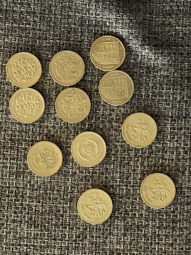 Old circular coin - £1,