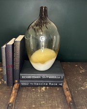 Beautiful Objects: A large glass vase with distinctive shape and layered colours