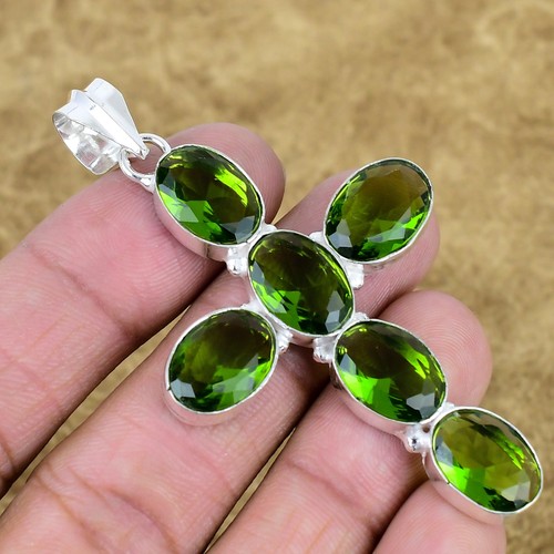 Faceted peridot gemstone - faceted,