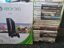 xbox 360 e 4gb boxed x23 games