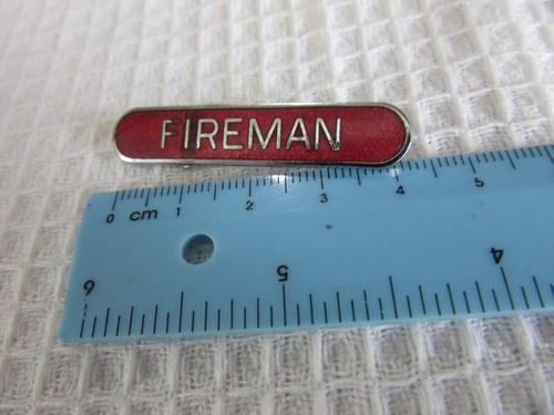 Fireman vintage badge - fireman,