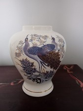 Vintage Vase With Peacock Design.