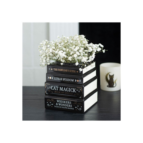 Black cat magick book - book, stack
