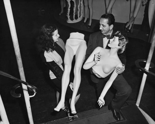 Woman carries lower half - , a