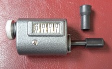 Vintage Revoloution counting tool with two spare tips and case.