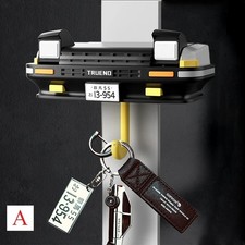 Add a unique automotive touch to your room with this AE86 Car Headlight Key Hang