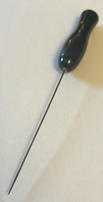 Silver metal hat pin with an upside down black skittle shaped bead