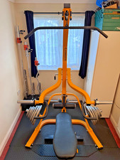 Powertec Workbench LeverGym (see video) + accessory leg curl + 125 Kg of plates