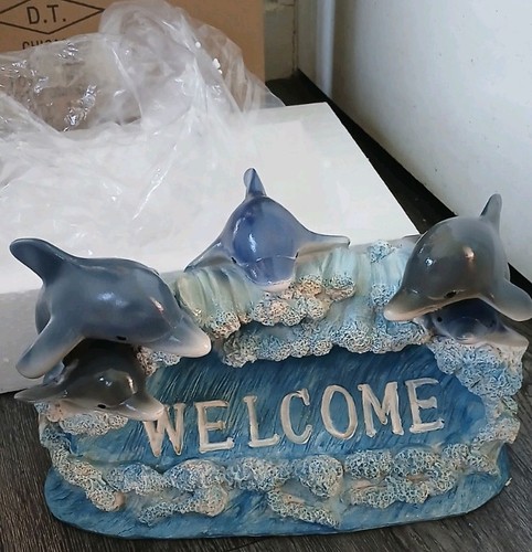 Dolphin welcome sign statue - welcome,