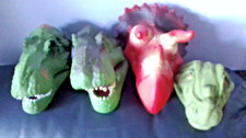 3 x hard plastic + 1 x rubbery dinosaur hand puppets