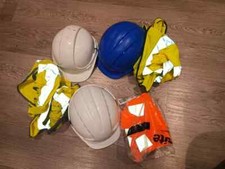 Three Hard Hats and Hi-Vis Jackets. Also included ONE Brand-New Hi Vis in Packig