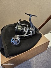 Spinning Reel ME6000 Unused Has Reel Pouch Loaded With 10lb GuruFeeder Sink Line