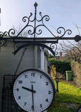 Gents Double Sided 24" Outside Dial Slave Clock, and original ornate bracket.
