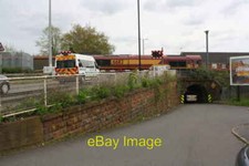 Photo 6x4 Ambulance waits for car train at Barkers Butts Lane level cross c2018
