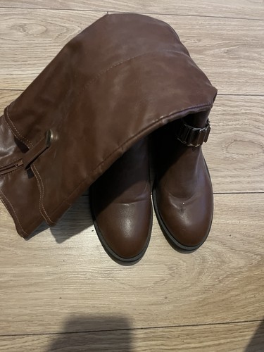 Brown leather knee high boots
