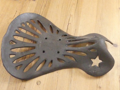 Cast iron saddle - cast, bar