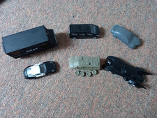 Various vehicles cars SWAT truck and Batmobile Walking Dead Batman Post Apoc