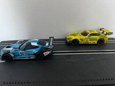 1 each of Carrera and SCX 1/43 Mercedes AMG GT3 cars