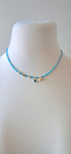 Turquois beaded evil eye - turquois,