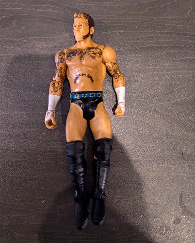 Wrestling figure tattooed arms - figure,