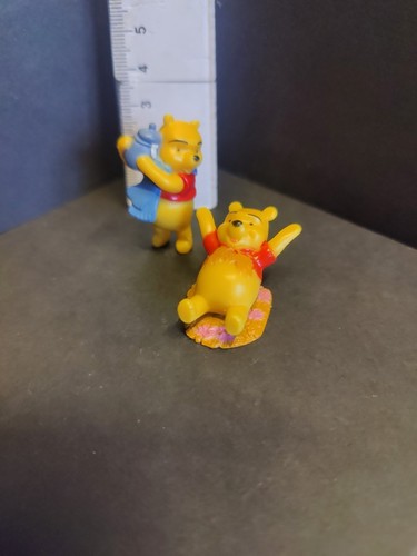 Pair pooh bear collectable - of,