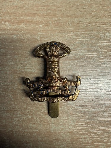 Cap badge from the - cap,