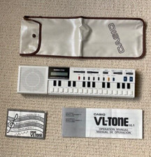 Vintage Casio VL-Tone VL1 Electronic music instrument and calculator