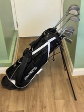 *MENS HOWSON SET OF GOLF CLUBS