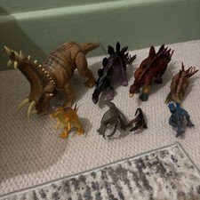 large bundle of dinosaur figures