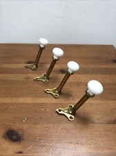 4 Victorian porcelain and Brass coat hooks