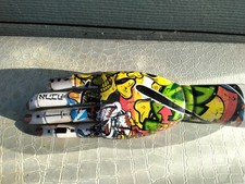 tattooed wooden mannequin hand